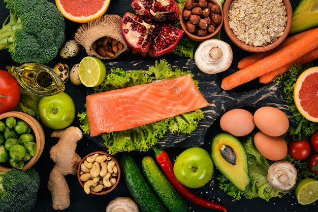 imgi 285 healthy food fish salmon avocado broccoli fresh vegetables nuts fruits black background top view copy space 187166 24721 imgi 285 healthy food fish salmon avocado broccoli fresh vegetables nuts fruits black background top view copy space 187166 24721